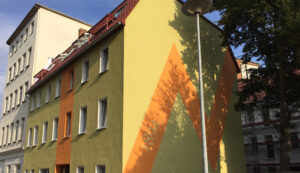 Kernsanierung Mehrfamilienhaus mit WDVS an Fassade